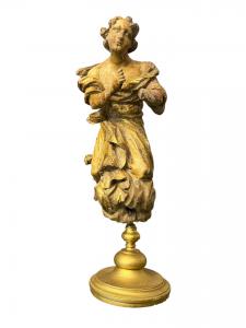 Scultura in legno intagliato e dorato 